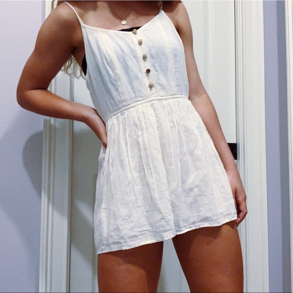 Adorable white flowy romper